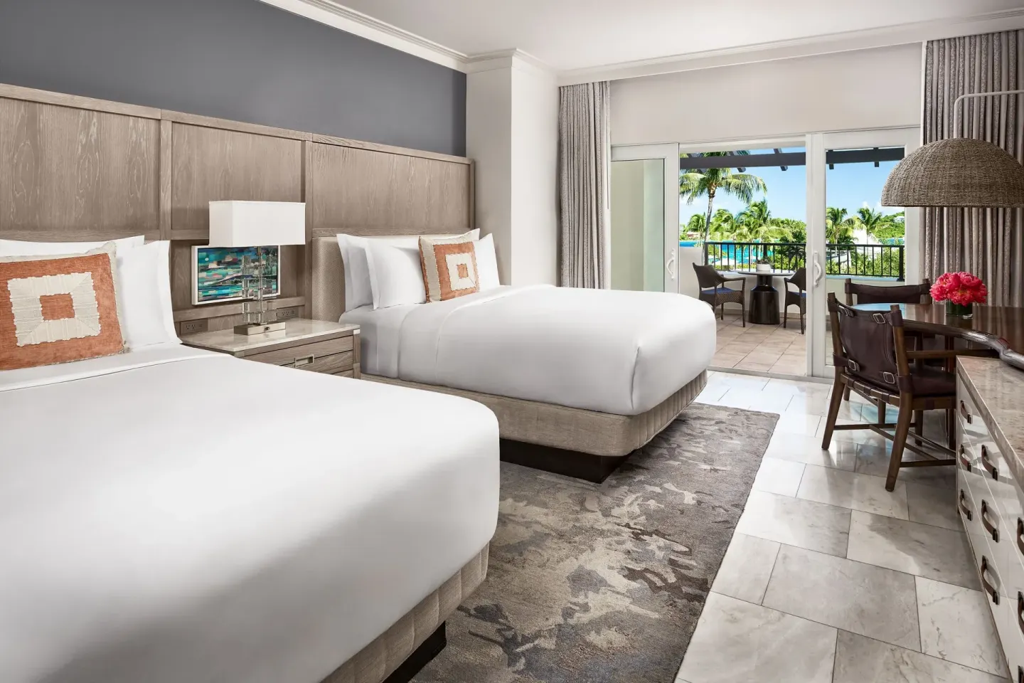 Resort View Room with two beds and balcony access at The Ritz-Carlton, St. Thomas.