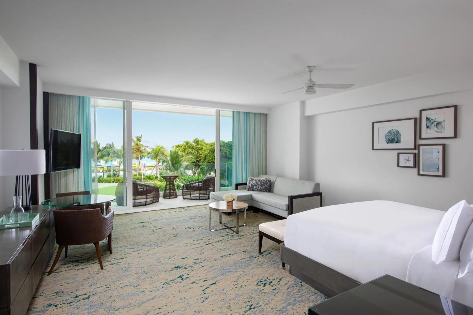 King bed guest room with terrace and garden view at The Ritz-Carlton, Turks & Caicos.