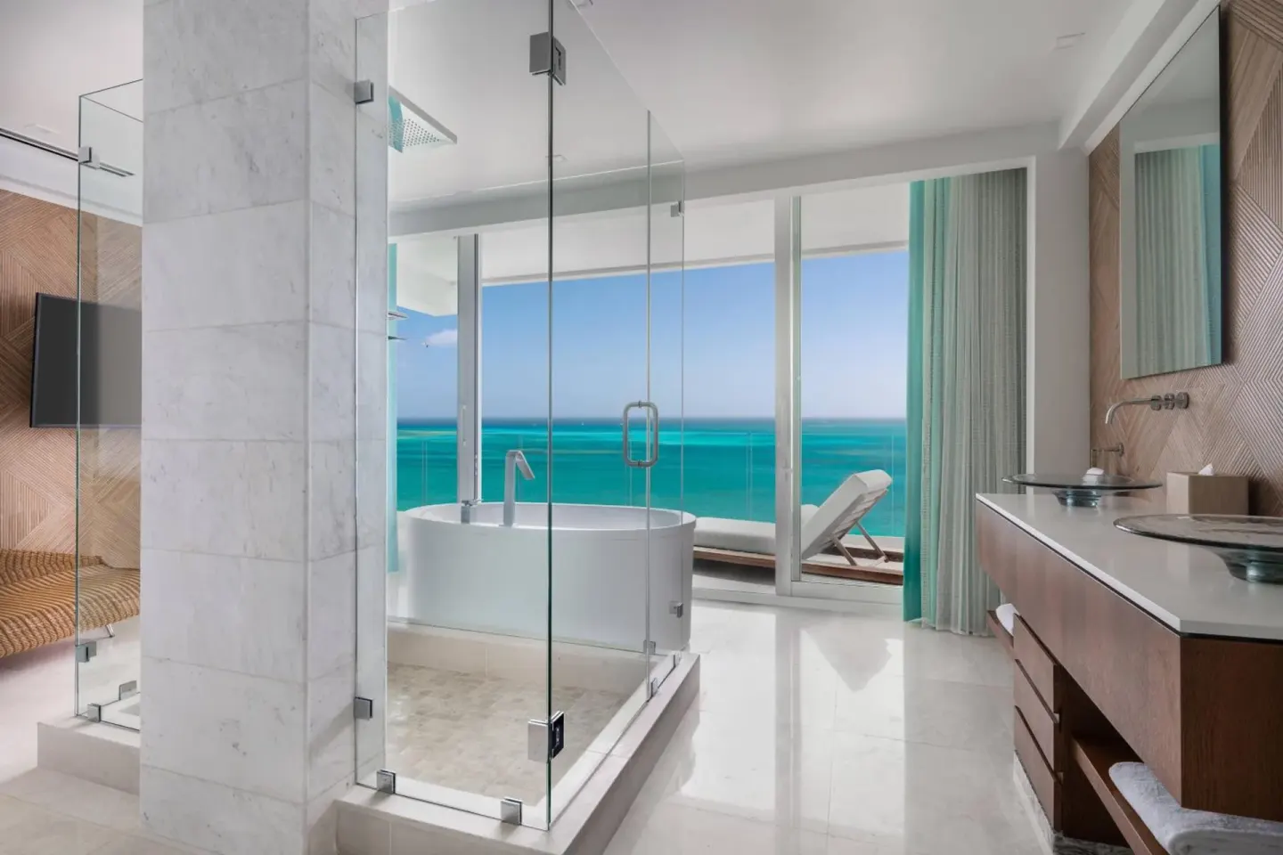 Ocean view bathroom with freestanding tub at The Ritz-Carlton, Turks & Caicos.