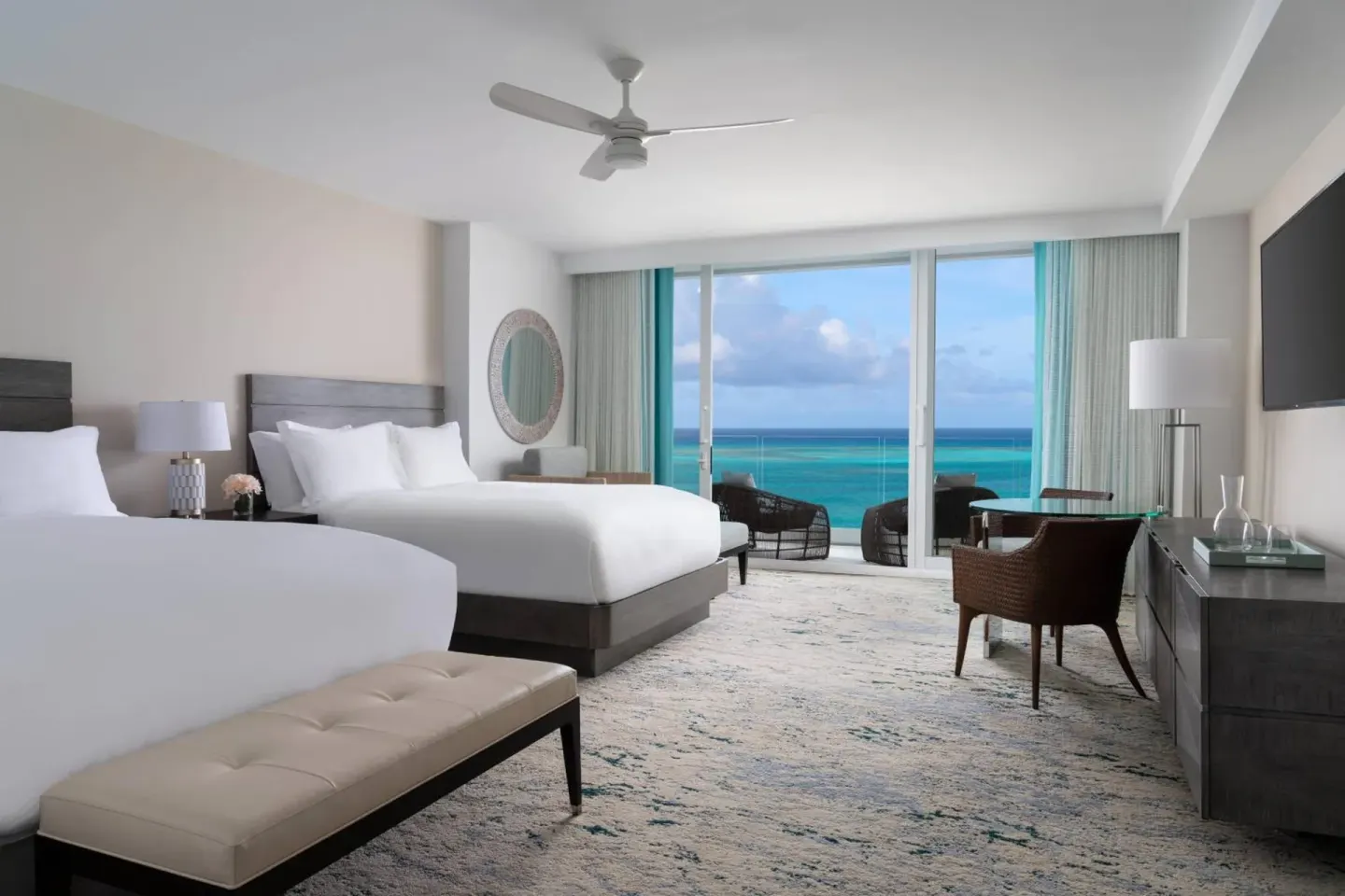Ocean-view guest room with two beds at The Ritz-Carlton, Turks & Caicos.