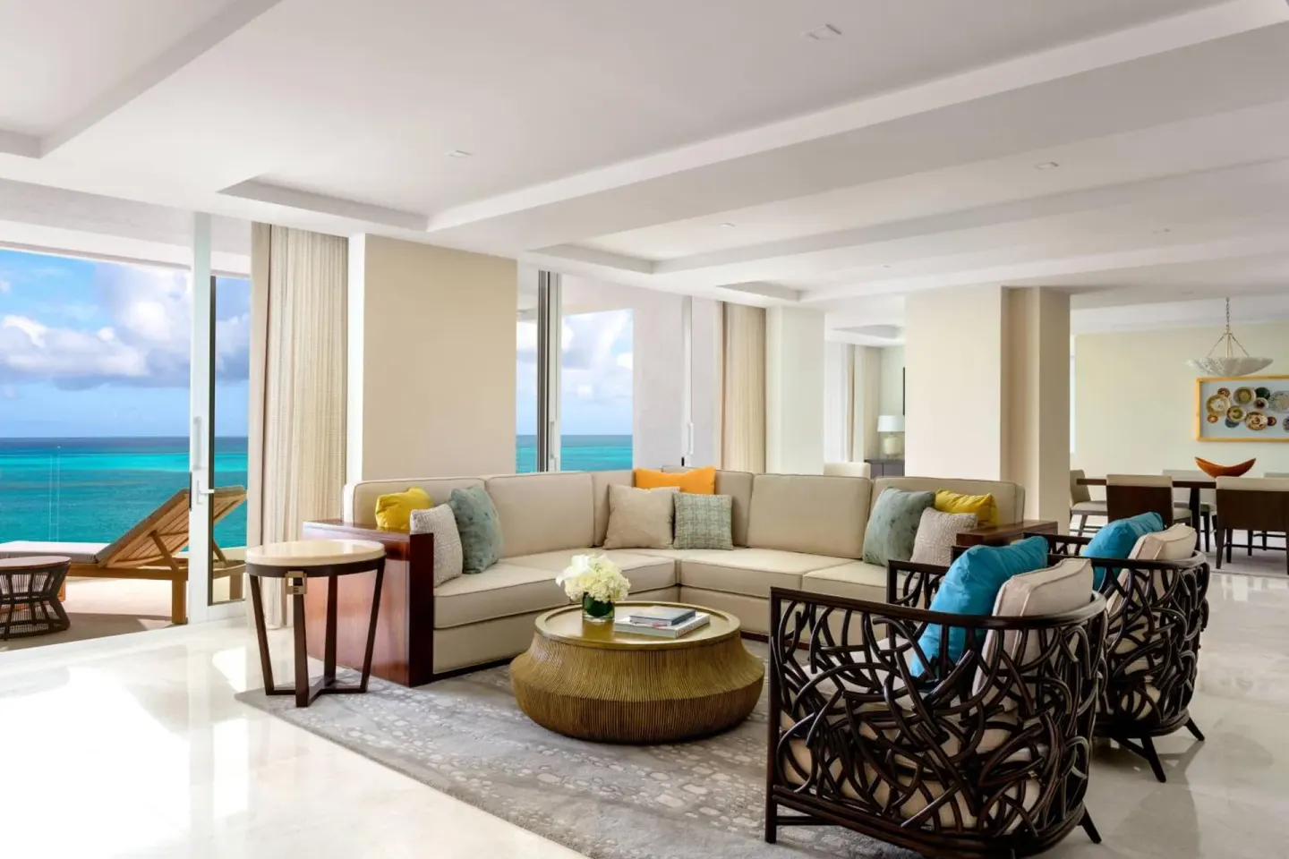 Oceanfront living room with sectional seating at The Ritz-Carlton, Turks & Caicos.