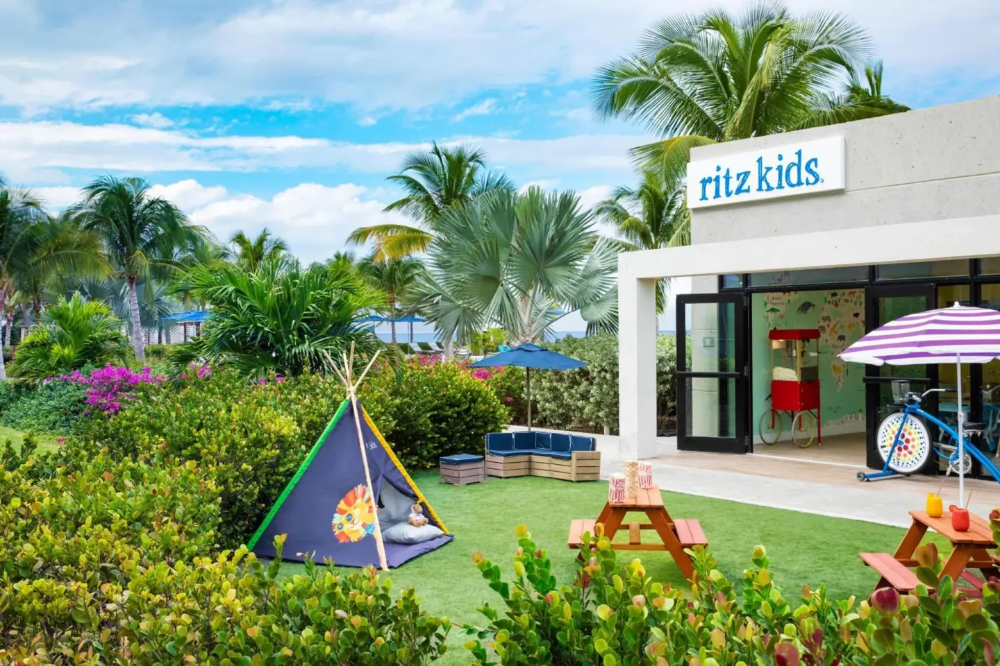 Ritz Kids play area with tent and picnic tables at The Ritz-Carlton, Turks & Caicos.