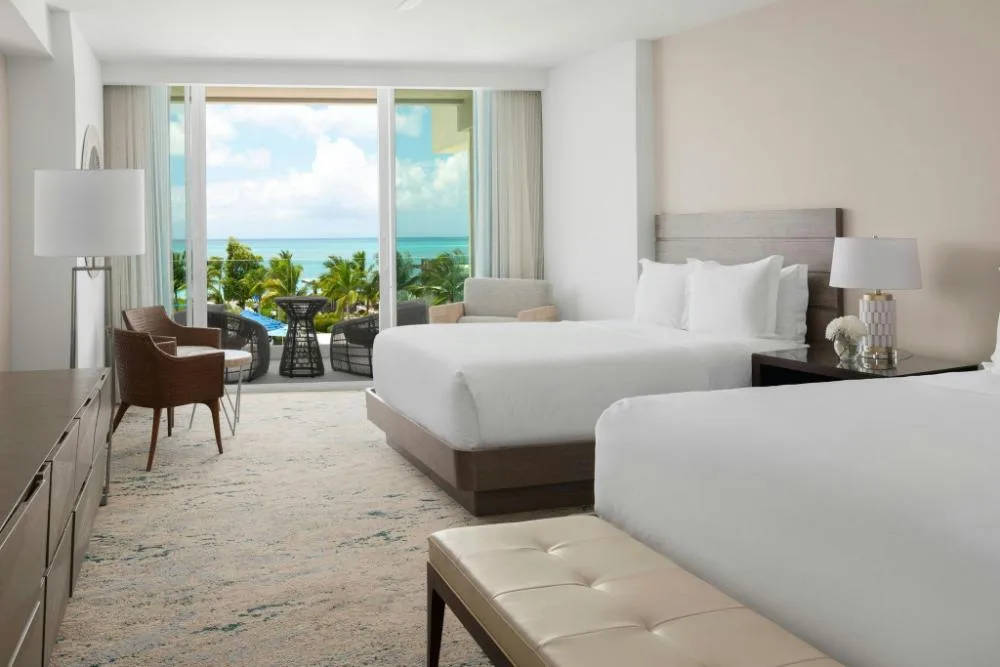 Deluxe guest room with two beds and balcony at The Ritz-Carlton, Turks & Caicos.