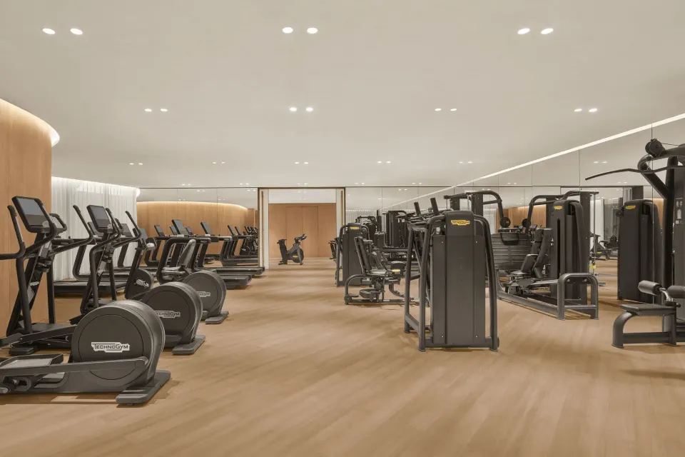 Fitness center with cardio and strength equipment at The Riviera Maya EDITION At Kanai.