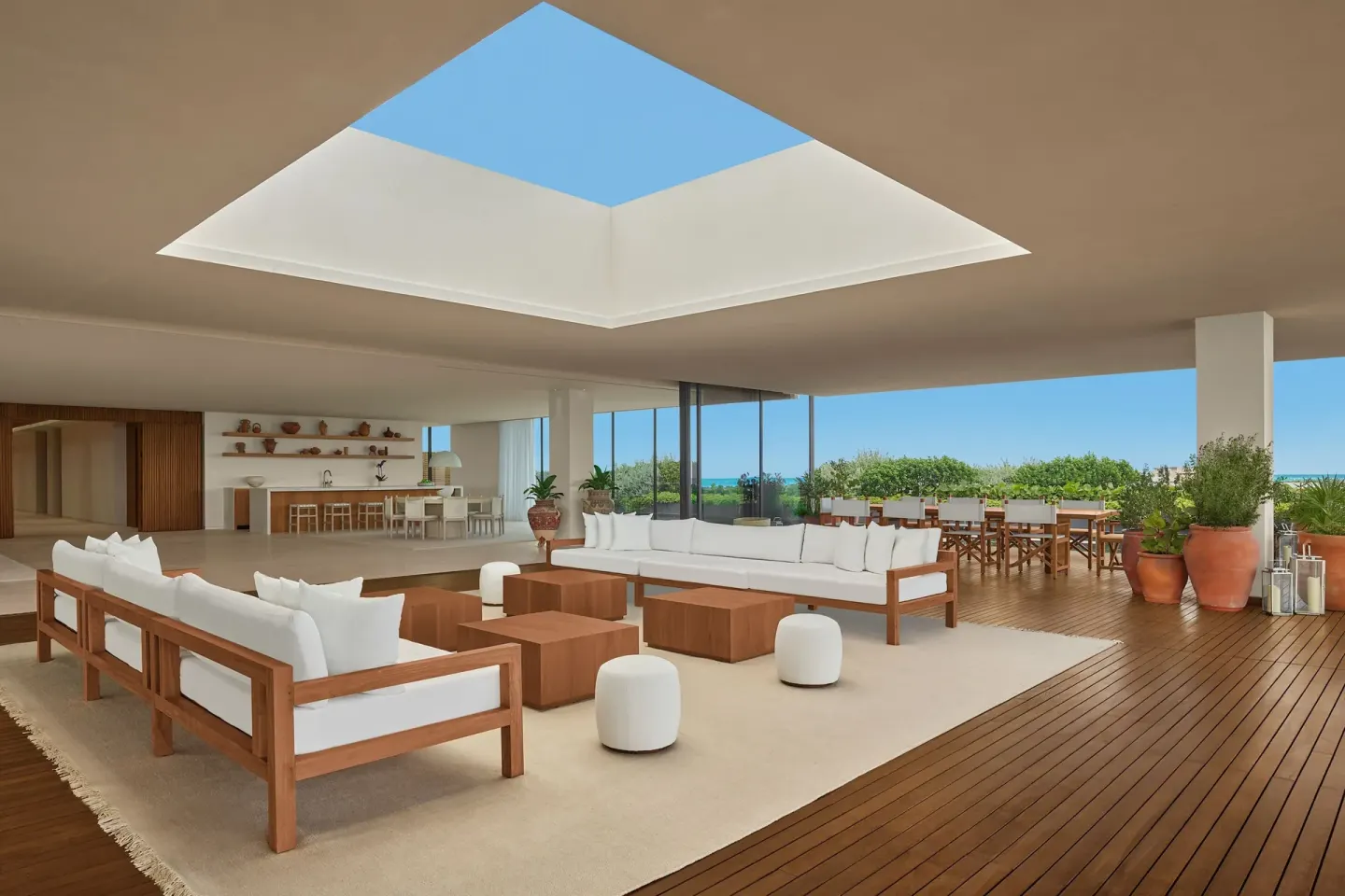 Open-air terrace lounge with sofas at The Riviera Maya EDITION At Kanai.