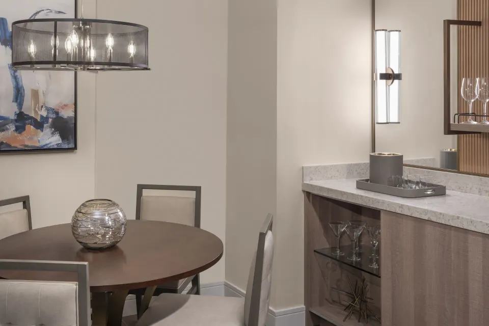 1 Bedroom Regal Suite dining table and wet bar area at The Royal at Atlantis.