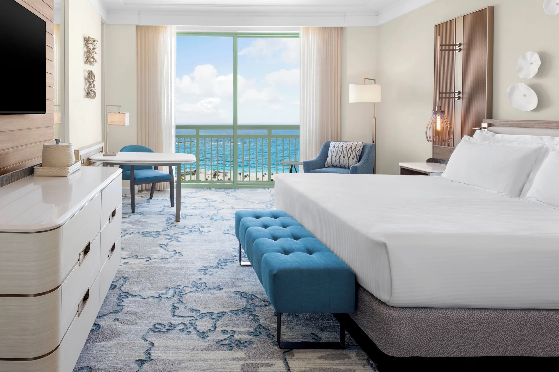 Imperial Club Water View room with king bed and ocean-facing balcony at The Royal at Atlantis.