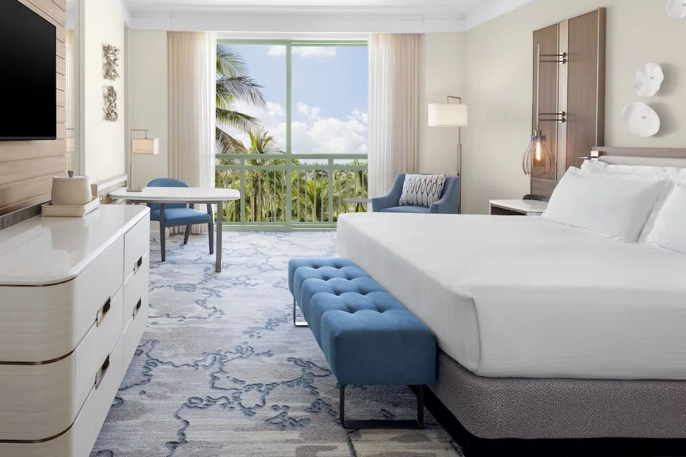 Terrace View Room at The Royal at Atlantis with king bed, private balcony, and modern amenities on Paradise Island Bahamas.
