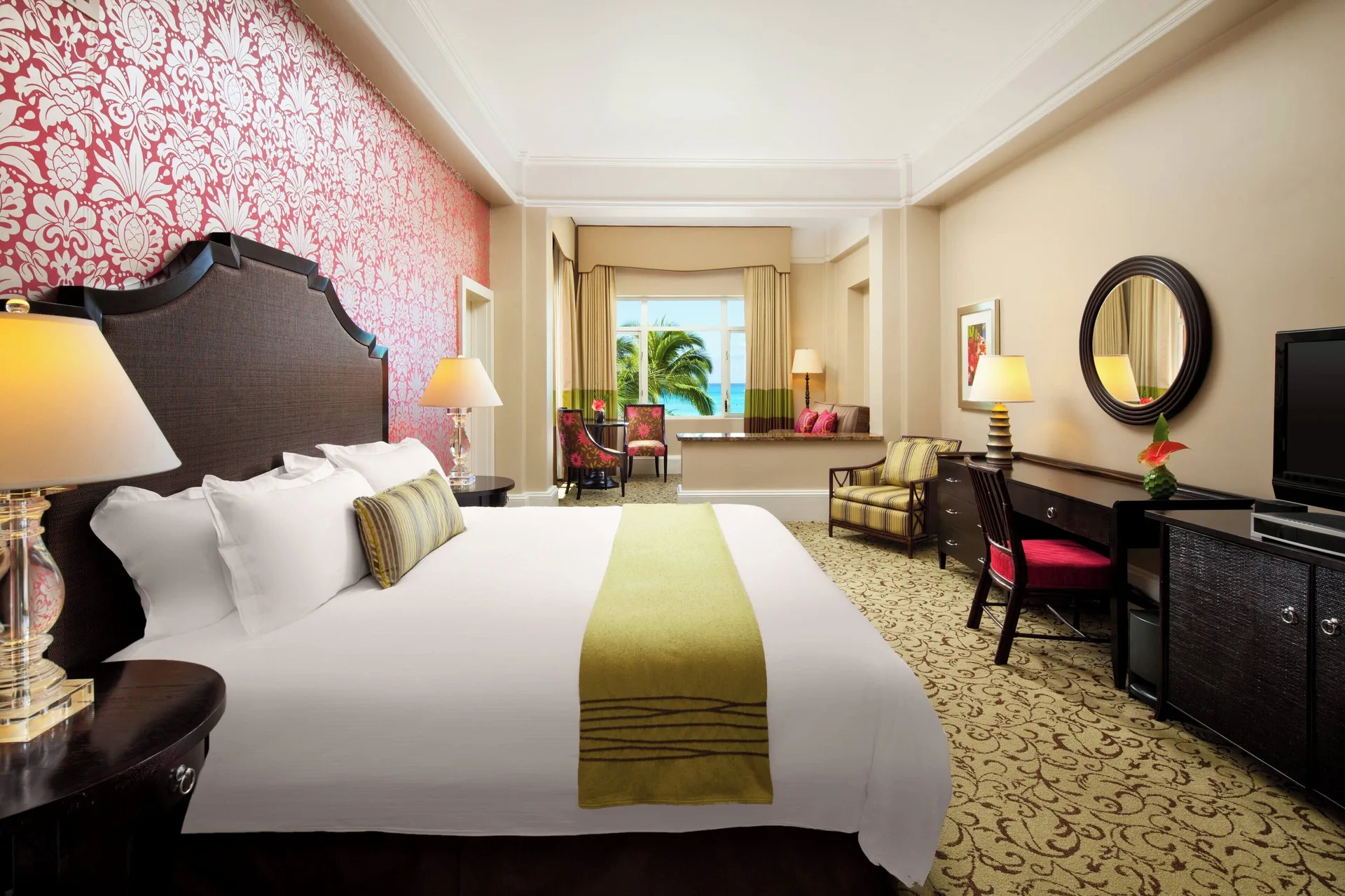 Deluxe Historic Wing king room with ocean-facing window at The Royal Hawaiian, Waikiki.