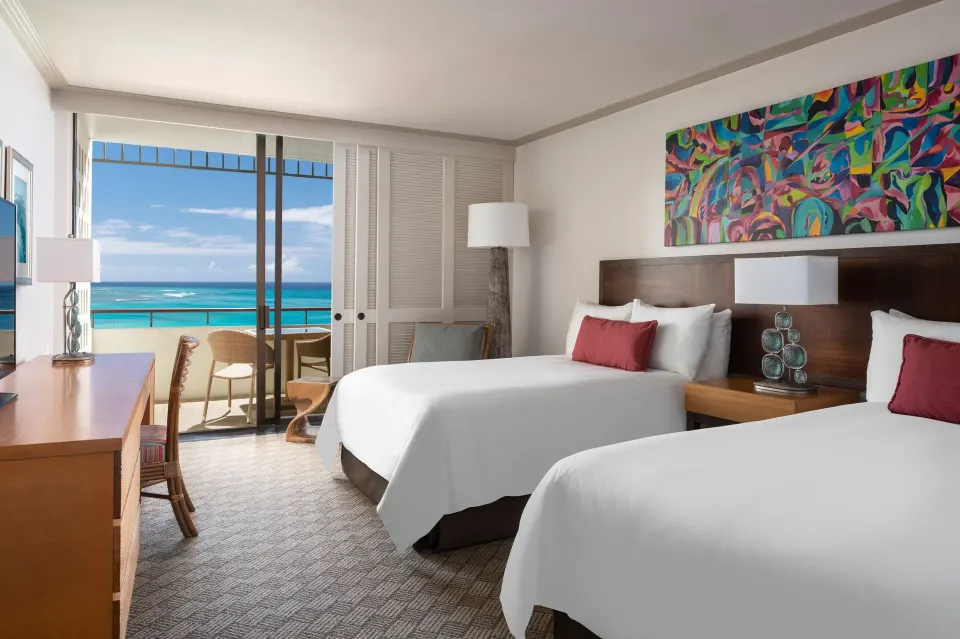 Mailani Ocean Corner room with two beds and balcony ocean view at The Royal Hawaiian, Waikiki.