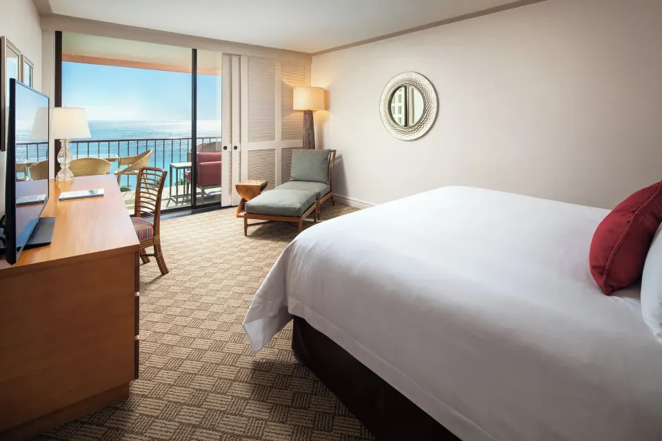Mailani Tower guest room with king bed and ocean-view balcony at The Royal Hawaiian, Waikiki.