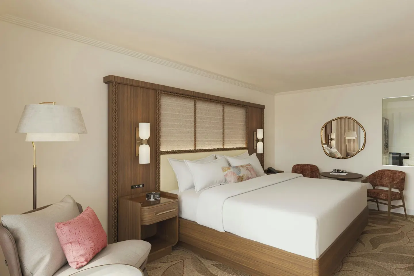 Mailani Tower room with king bed, lounge chair, and seating at The Royal Hawaiian, Waikiki.