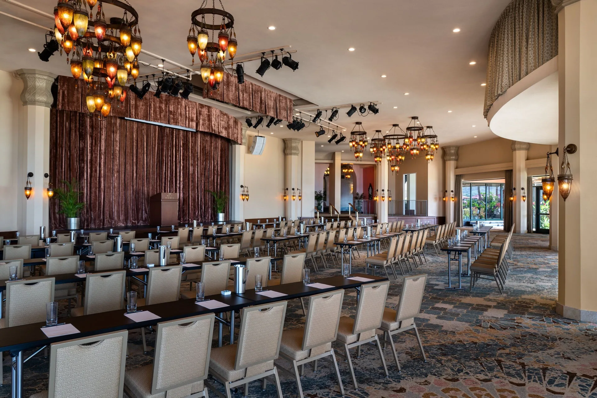 Conference room with long tables and lantern lights at The Royal Hawaiian, Waikiki.