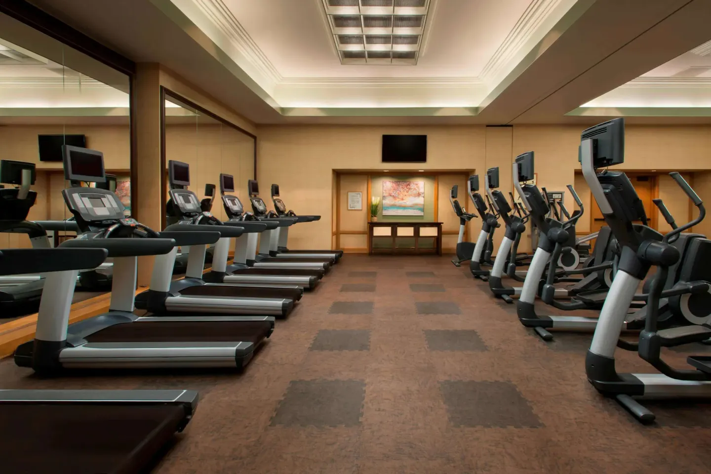 Fitness center with treadmills and cardio machines at The Royal Sonesta Kaua'i Resort Lihue.