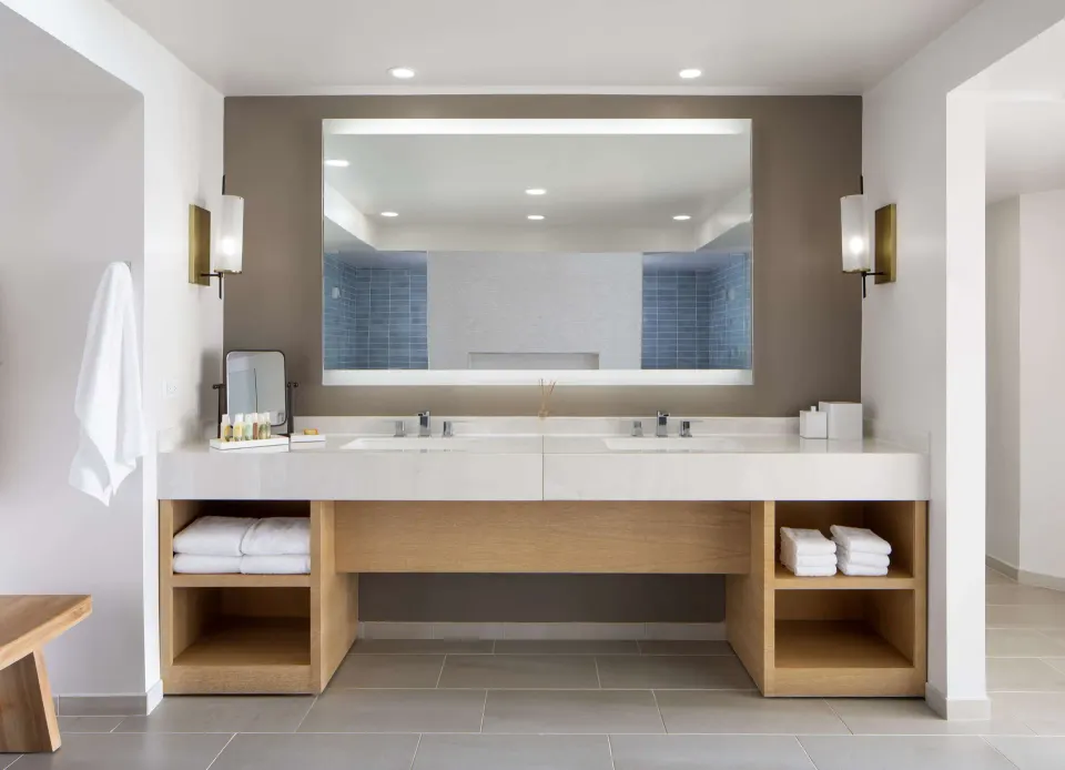 Oceanfront Presidential Suite bathroom vanity at The Royal Sonesta Kaua'i Resort Lihue with double sinks.