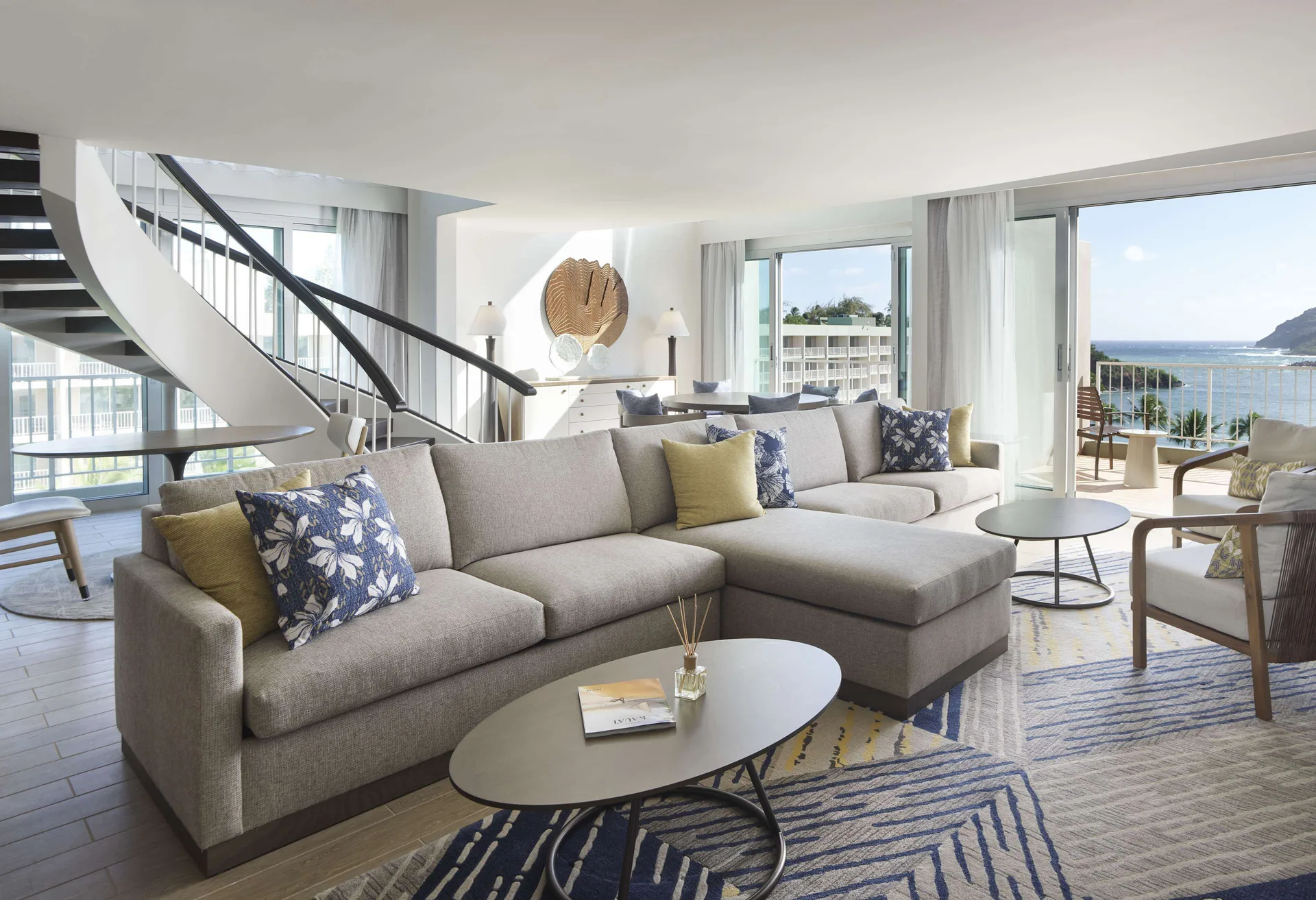 Oceanfront Presidential Suite living room at The Royal Sonesta Kaua'i Resort Lihue with balcony and ocean view.