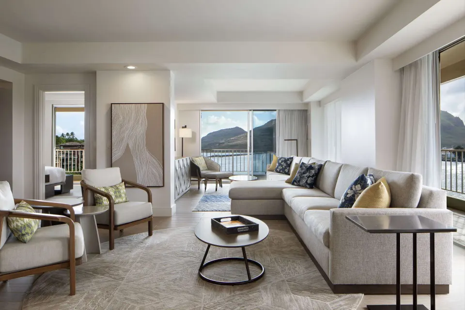 Oceanfront Vice Presidential Suite living room at The Royal Sonesta Kaua'i Resort Lihue with balcony views.