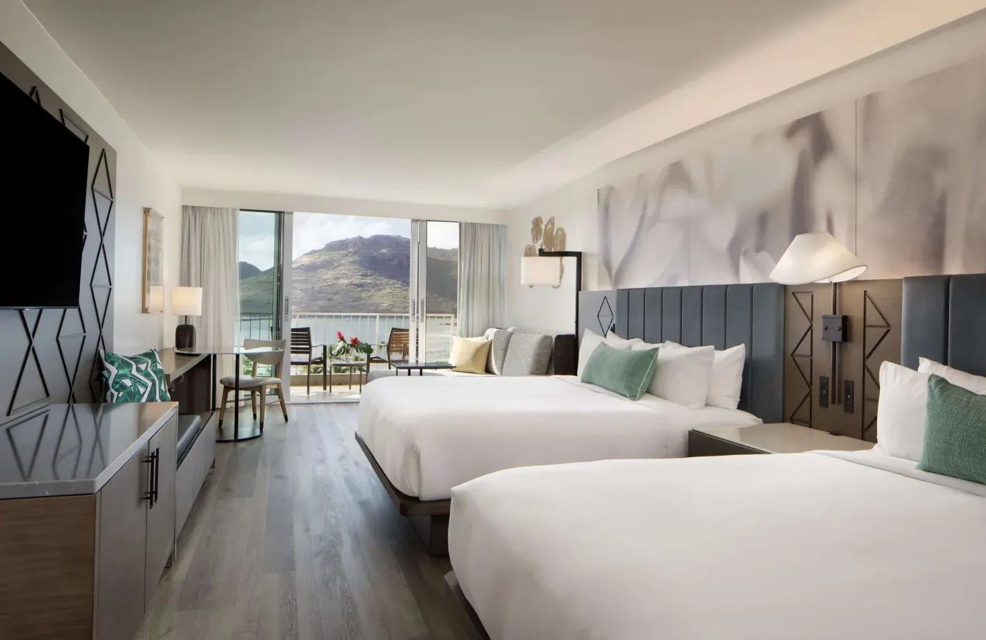Two Queens Ocean View guest room with balcony at The Royal Sonesta Kaua'i Resort Lihue.