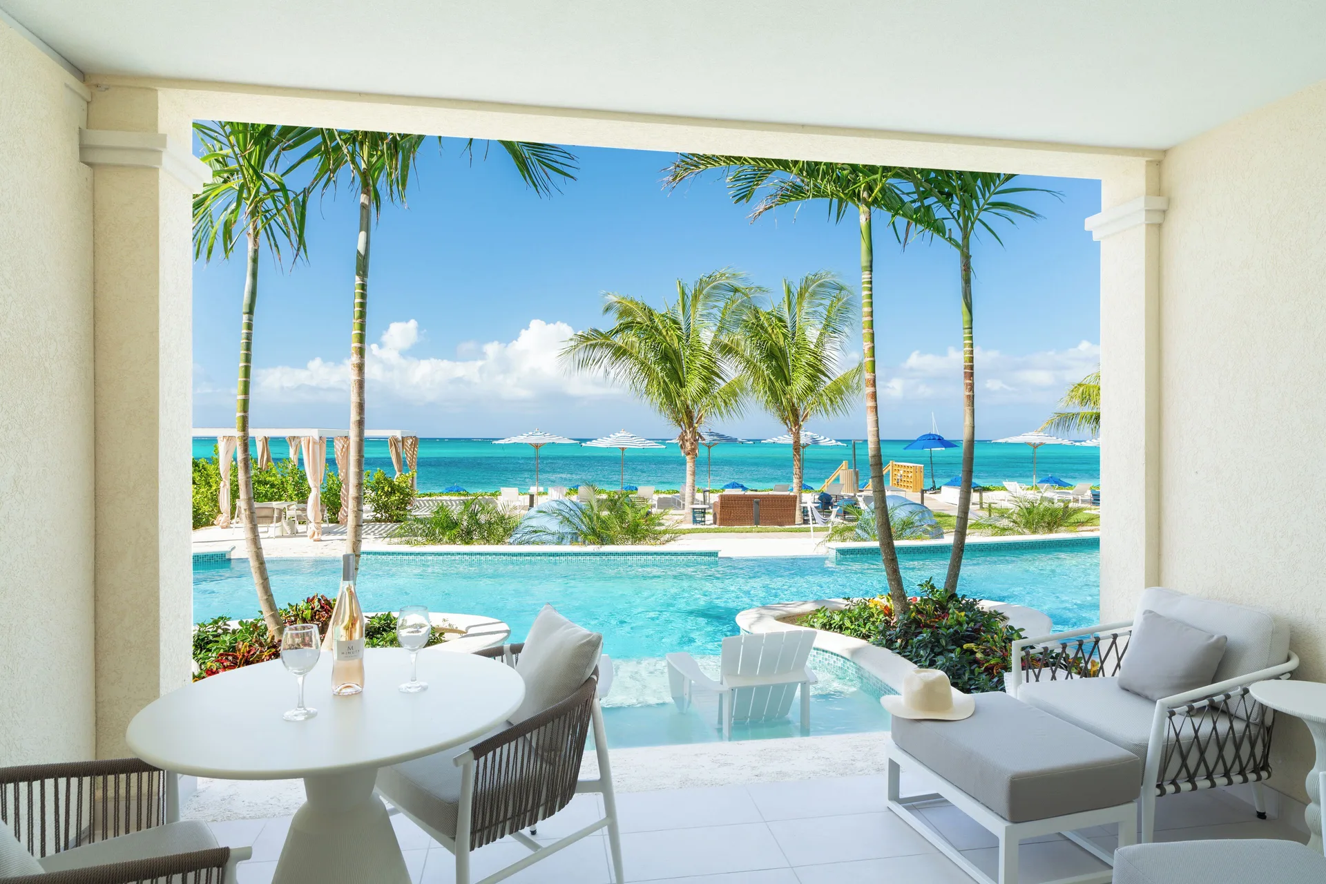 Beachfront at Windsong on the Reef Grace Bay shoreline with snorkeling access and turquoise water