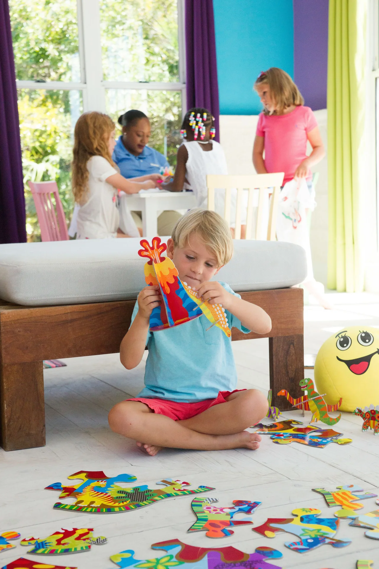 Children play with puzzles and crafts in the kids club at The Shore Club Turks and Caicos.