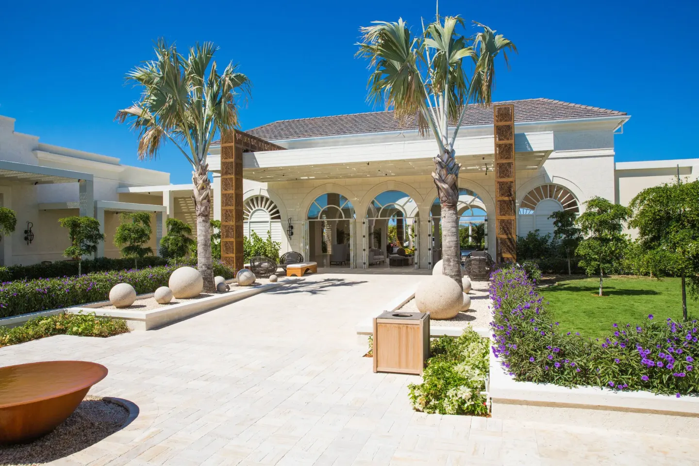 Sunny resort courtyard entrance at The Shore Club Turks and Caicos.