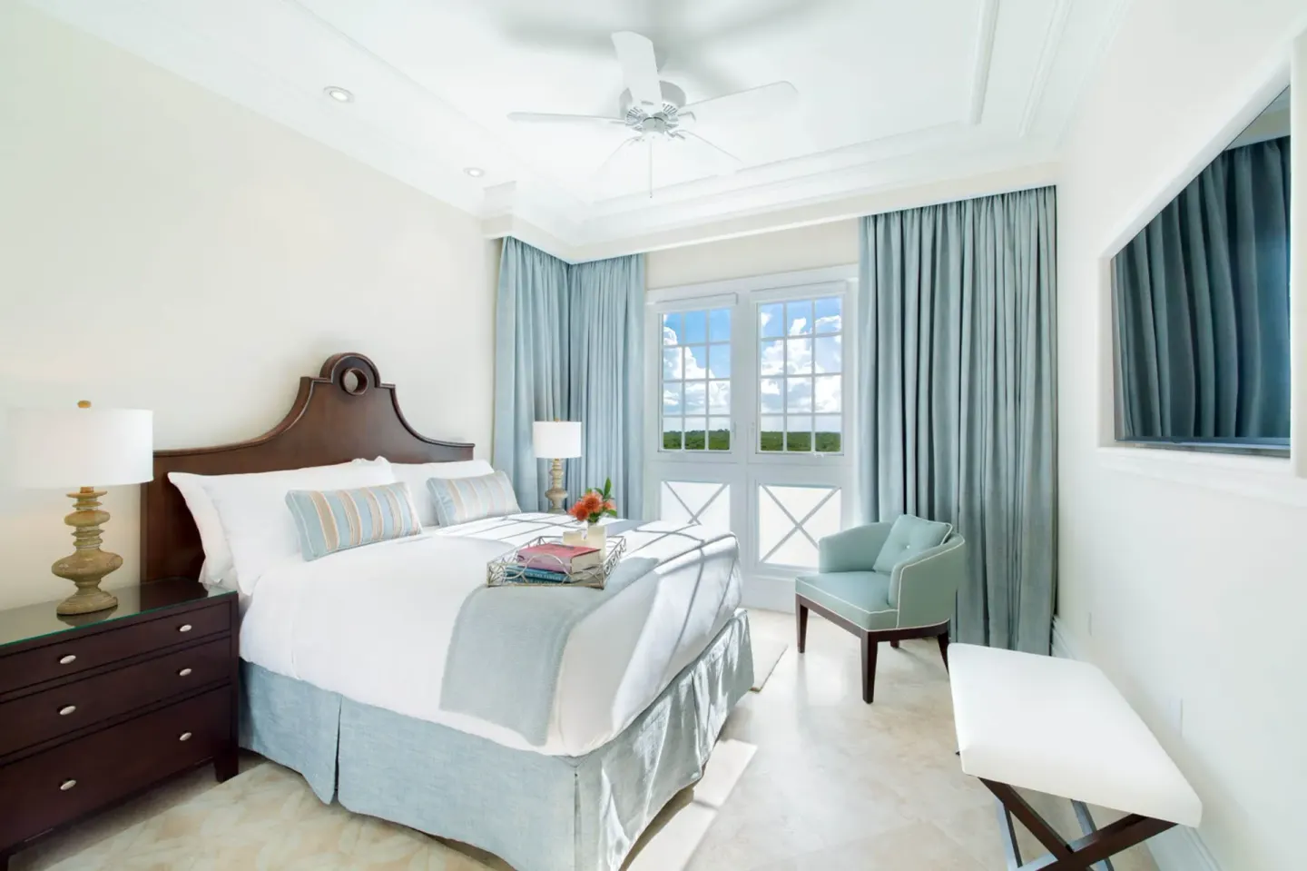 King bed in a Deluxe Room, 1 Bedroom, Oceanfront at The Shore Club Turks and Caicos.