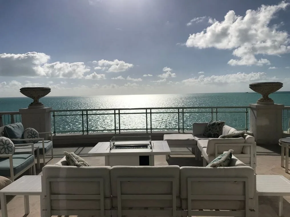 Oceanfront penthouse terrace seating at The Shore Club Turks and Caicos.