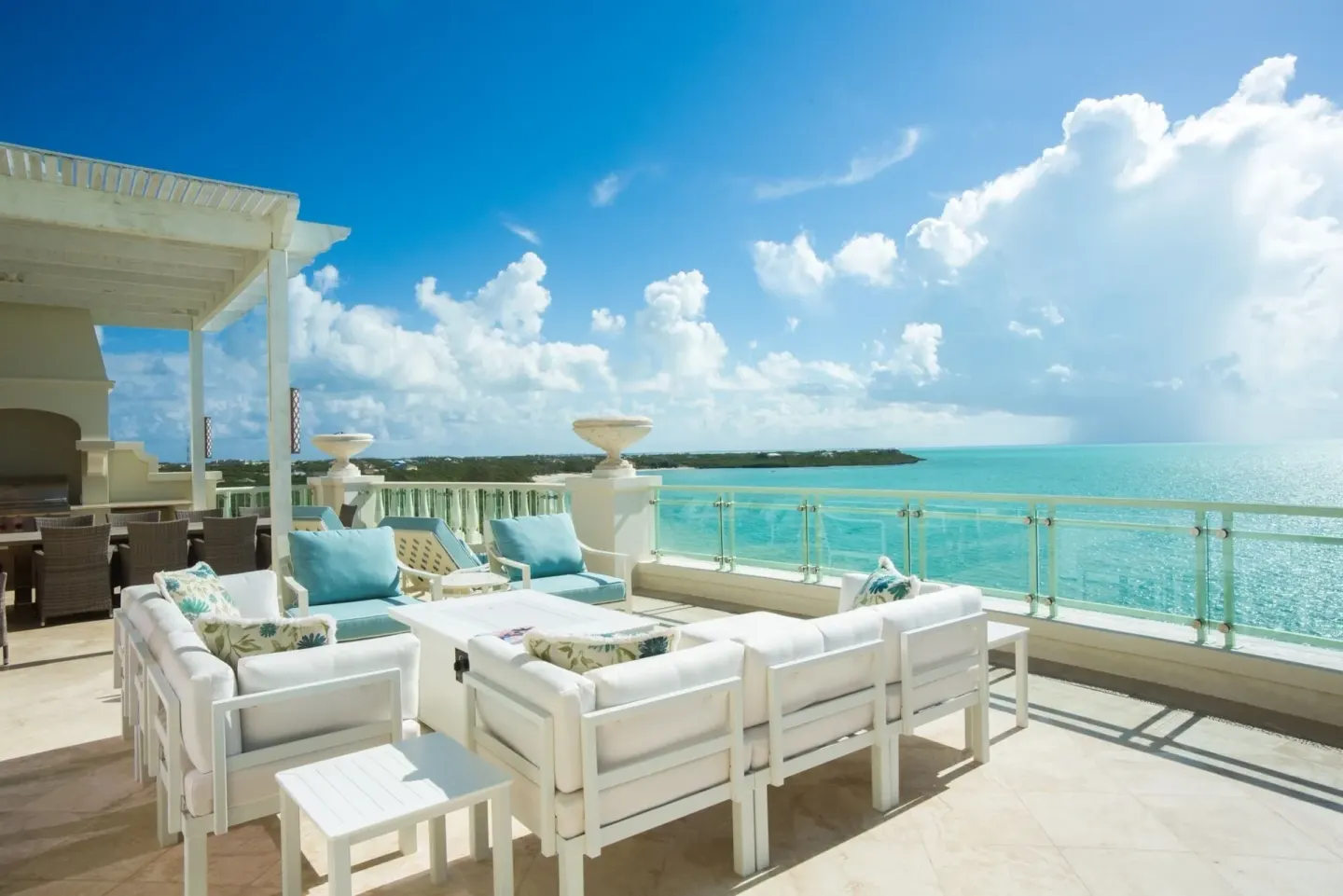 Penthouse terrace lounge with turquoise ocean view at The Shore Club Turks and Caicos.