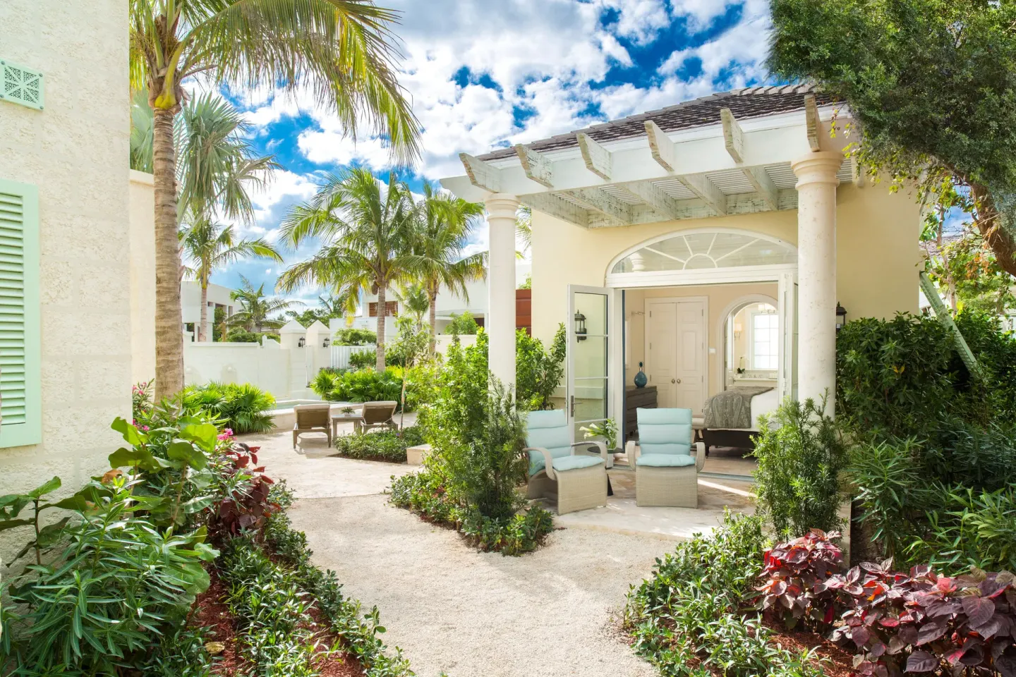 Luxury villa garden patio and bedroom doorway at The Shore Club Turks and Caicos.