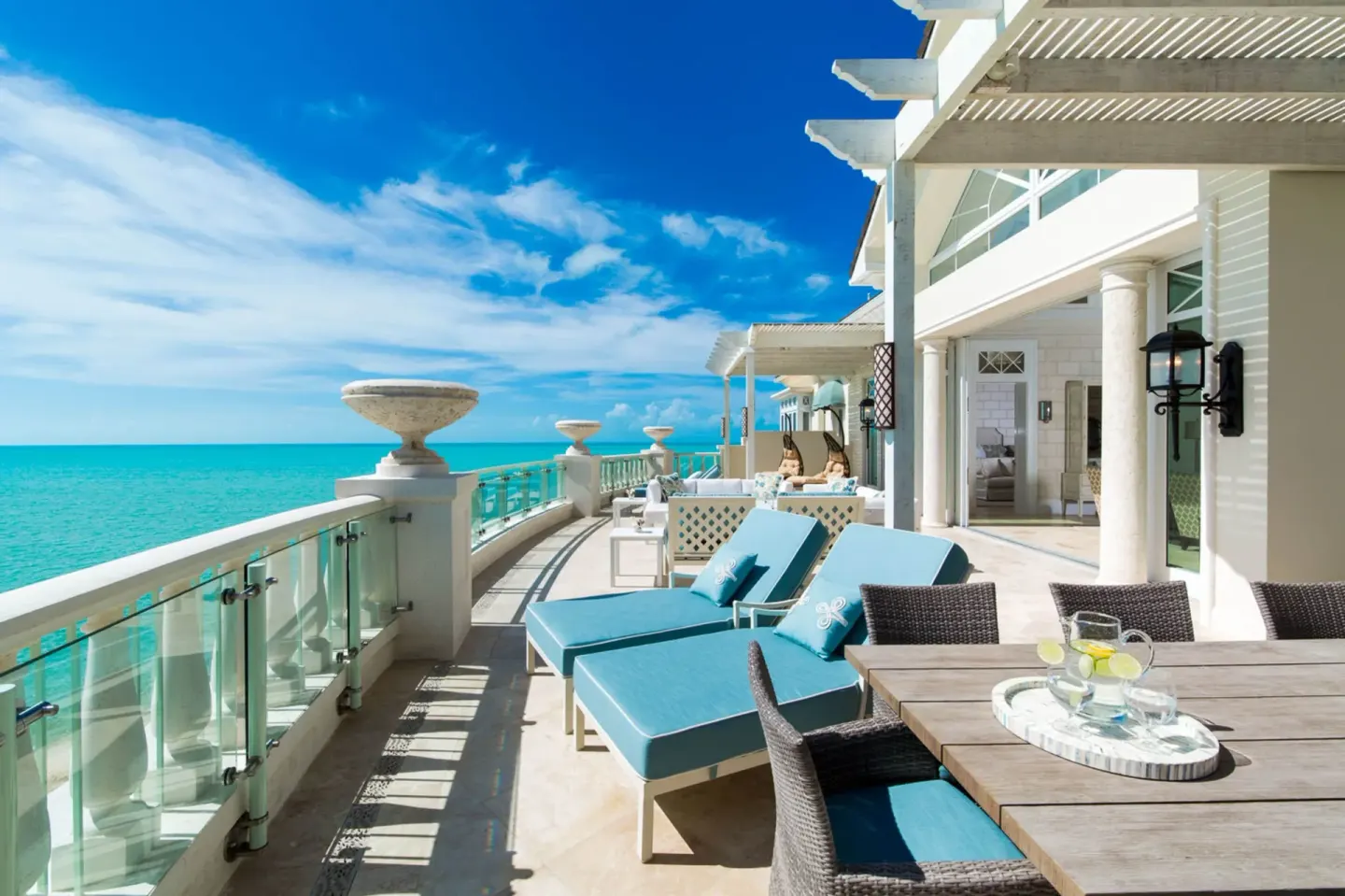 Penthouse oceanfront terrace with lounge chairs at The Shore Club Turks and Caicos.