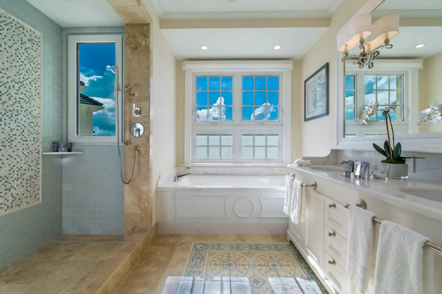 Penthouse bathroom with soaking tub and walk-in shower at The Shore Club Turks and Caicos.