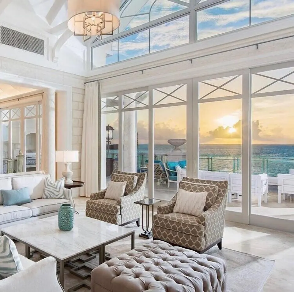 Penthouse living room with oceanfront terrace at The Shore Club Turks and Caicos.