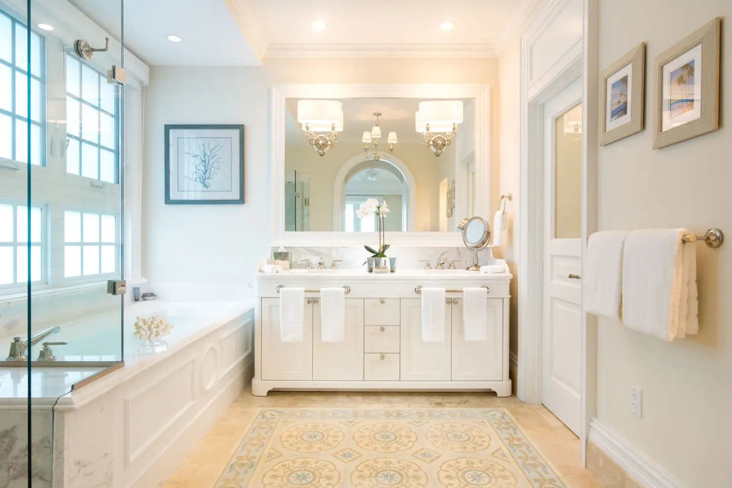 Oceanfront suite bathroom with tub, shower, and double vanity at The Shore Club Turks and Caicos.