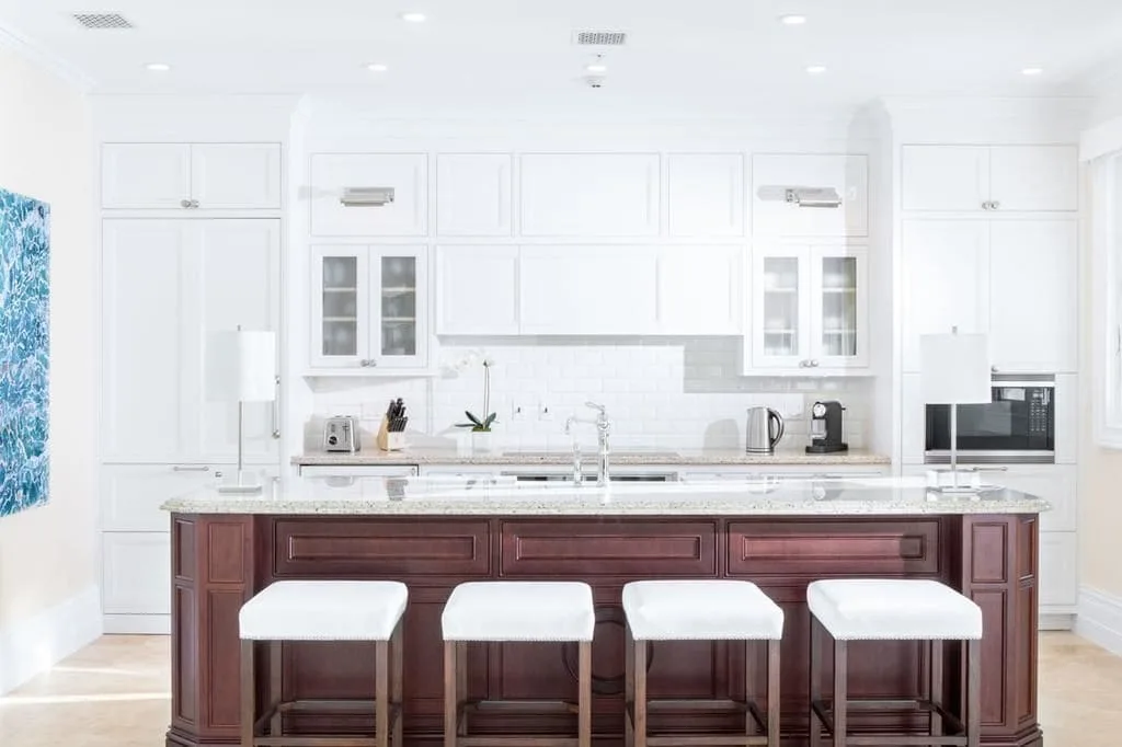 Oceanfront suite kitchen with island seating at The Shore Club Turks and Caicos.