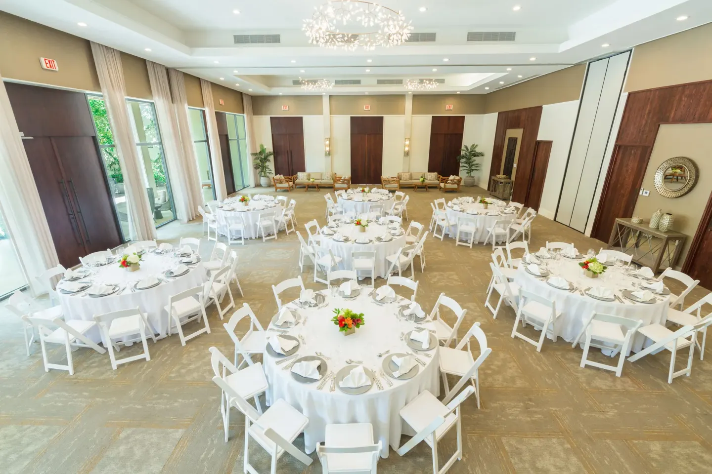 Round banquet tables set in an event room at The Shore Club Turks and Caicos.