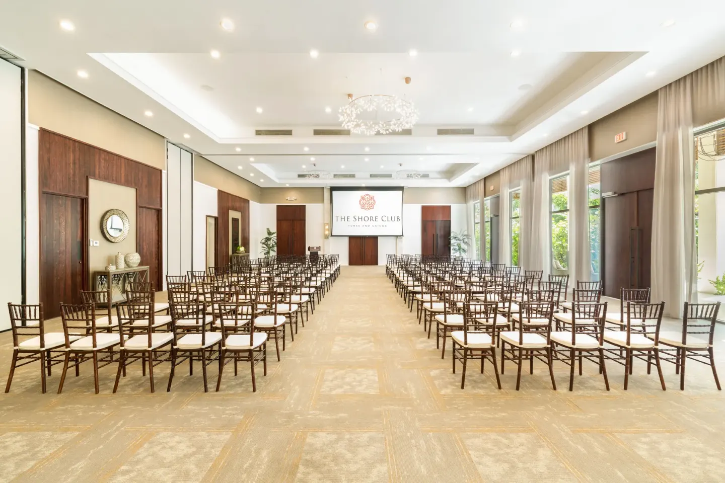 Rows of chairs facing a presentation screen at The Shore Club Turks and Caicos.