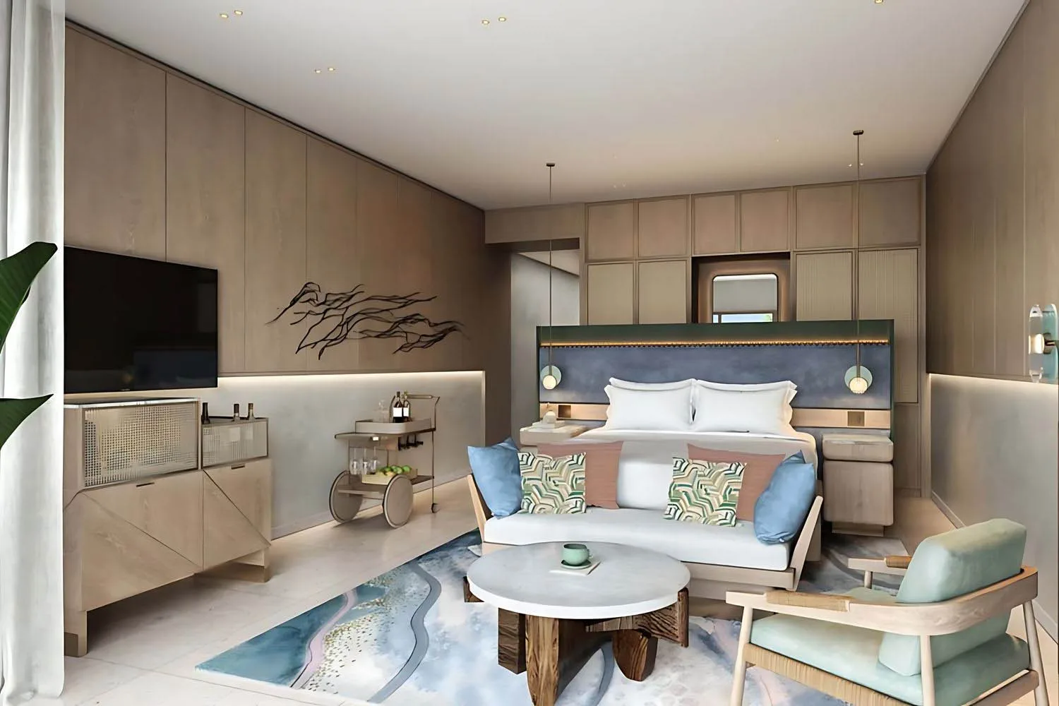 Deluxe Rooftop Room with king bed and seating at The St Regis Cap Cana Resort.
