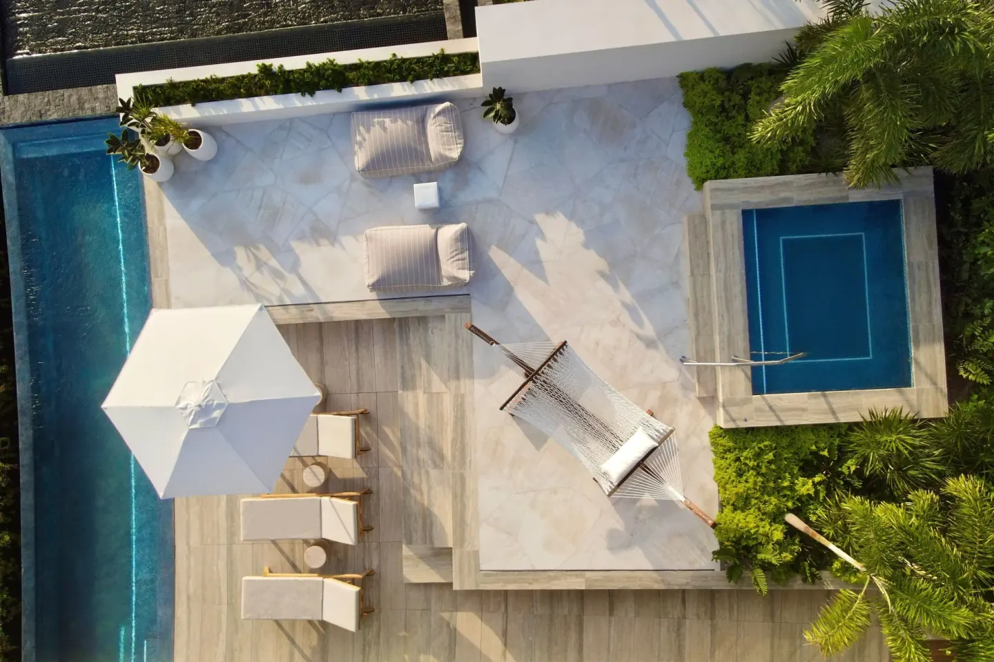 Private terrace with hammock and plunge pool at The St. Regis Kanai Resort, Riviera Maya.