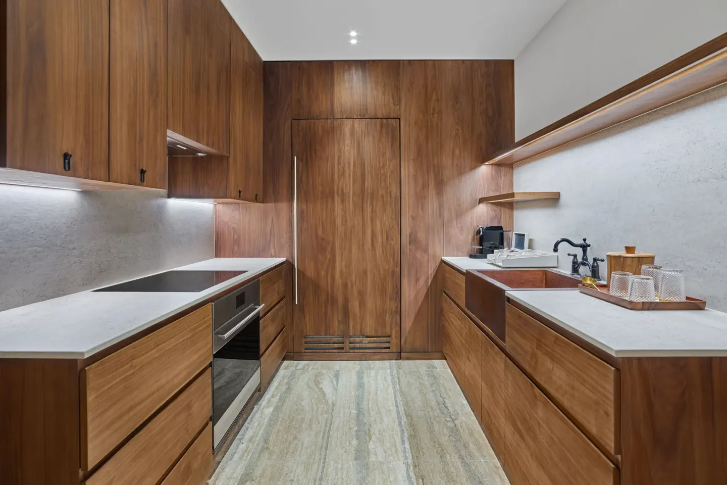 Suite kitchen with wood cabinetry at The St. Regis Kanai Resort, Riviera Maya.