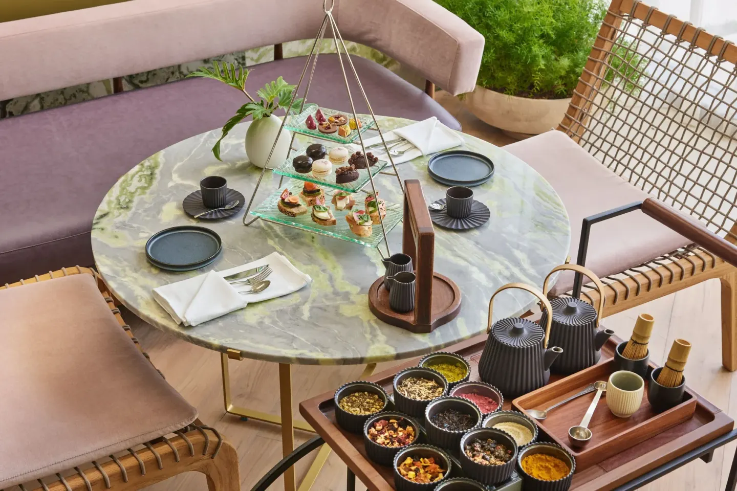 Afternoon tea service with pastries and tea blends at The St. Regis Kanai Resort, Riviera Maya.