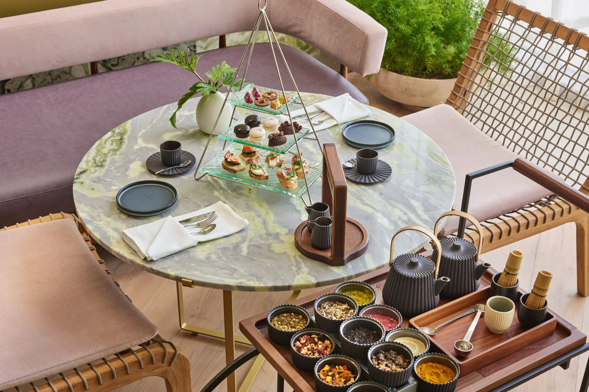 Afternoon tea service with pastries and tea blends at The St. Regis Kanai Resort, Riviera Maya.