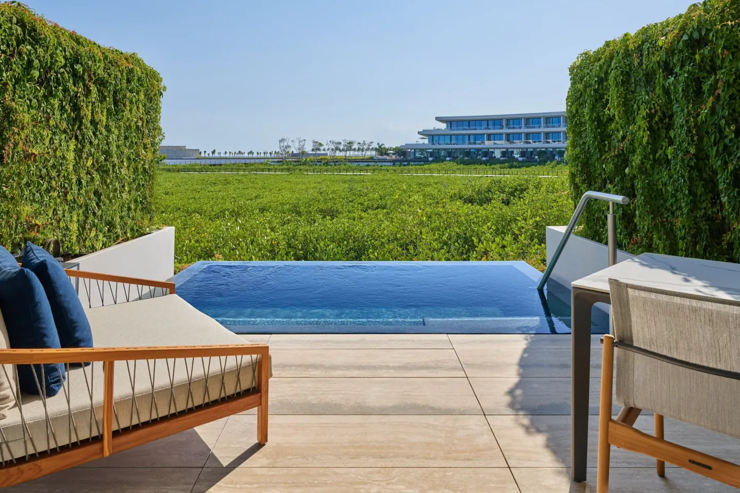 Private pool terrace with loungers at The St. Regis Kanai Resort, Riviera Maya.