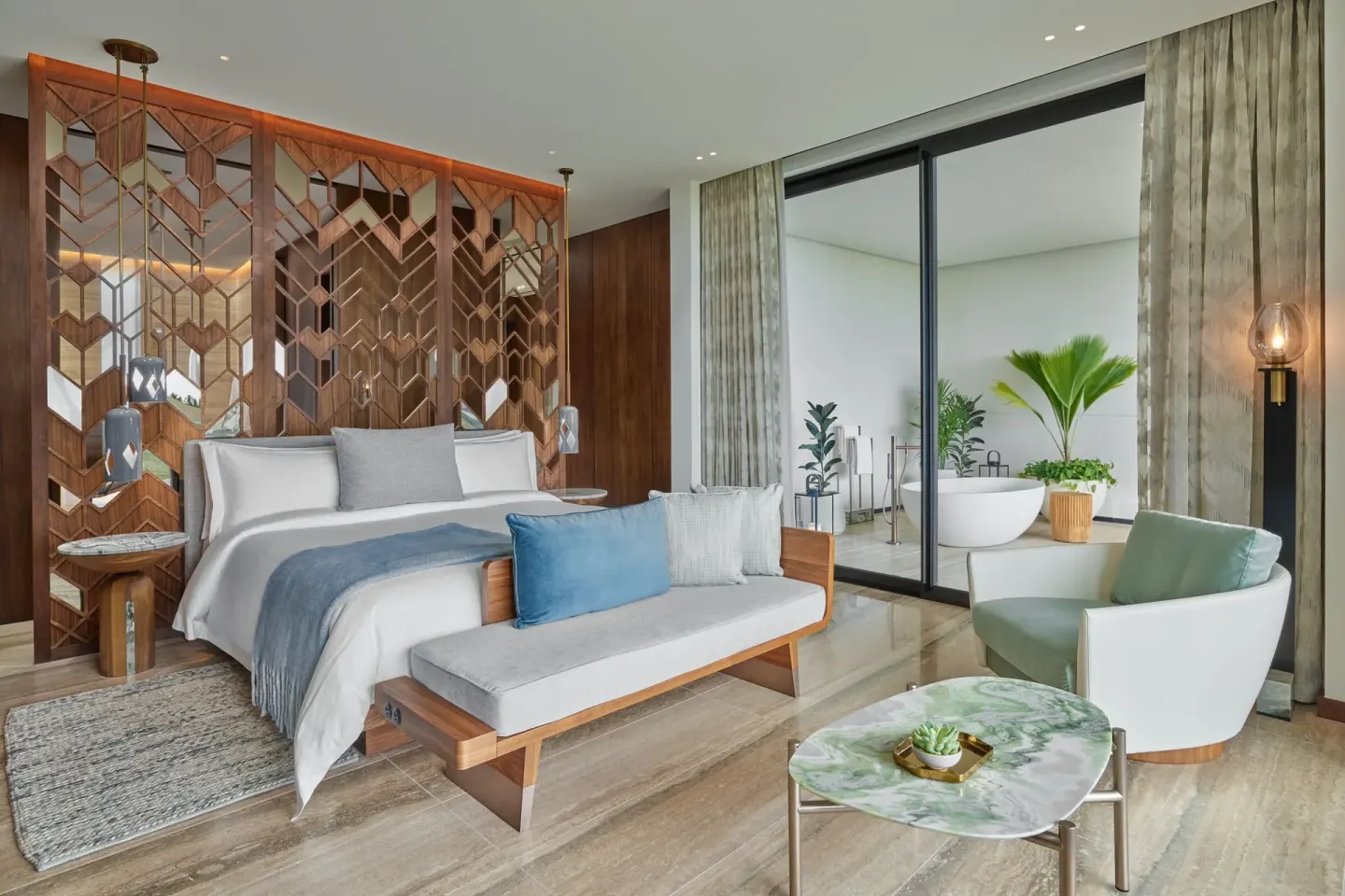 Corner Ocean View room with king bed and balcony tub at The St. Regis Kanai Resort, Riviera Maya.