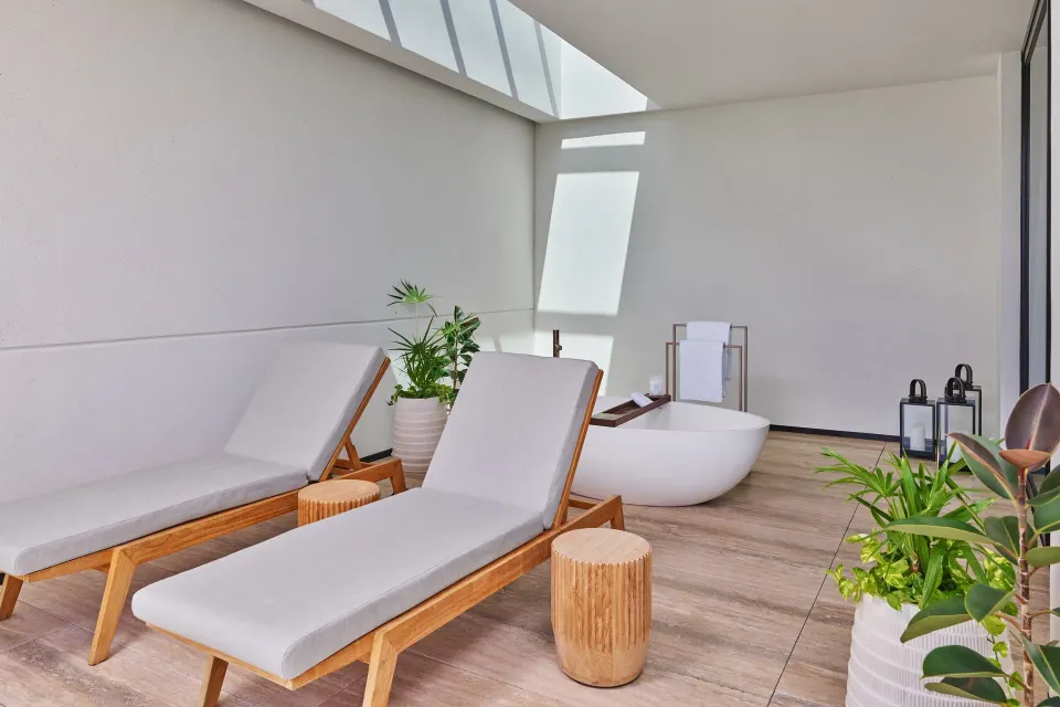Ocean View Suite terrace bathtub at The St. Regis Kanai Resort, Riviera Maya with loungers