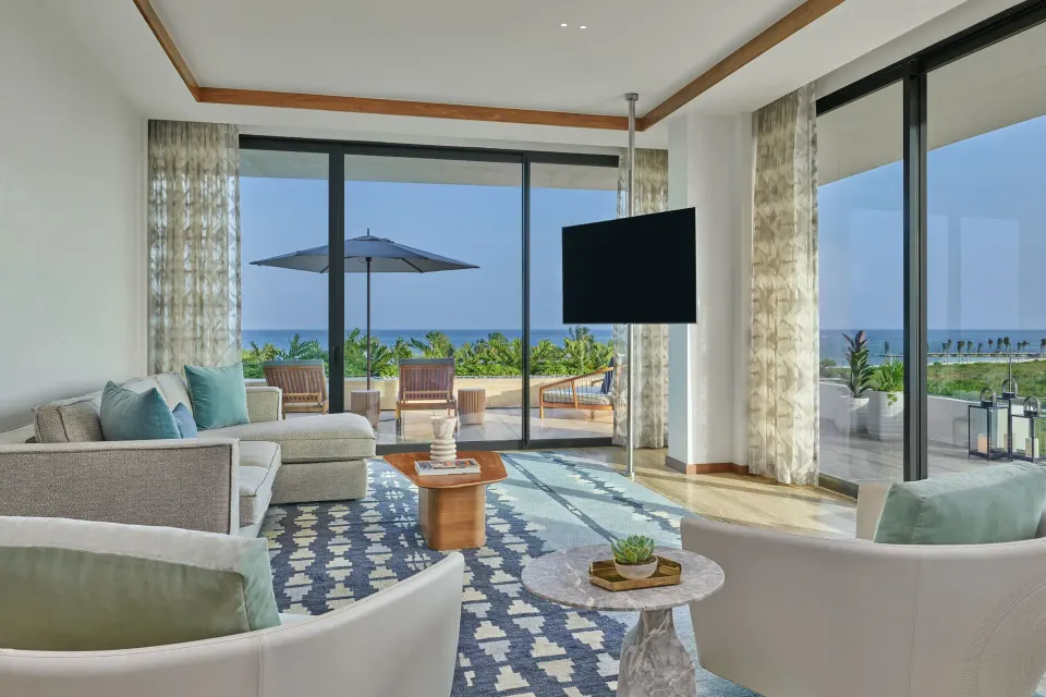 Ocean-facing living room in an Ocean View Suite at The St. Regis Kanai Resort, Riviera Maya.