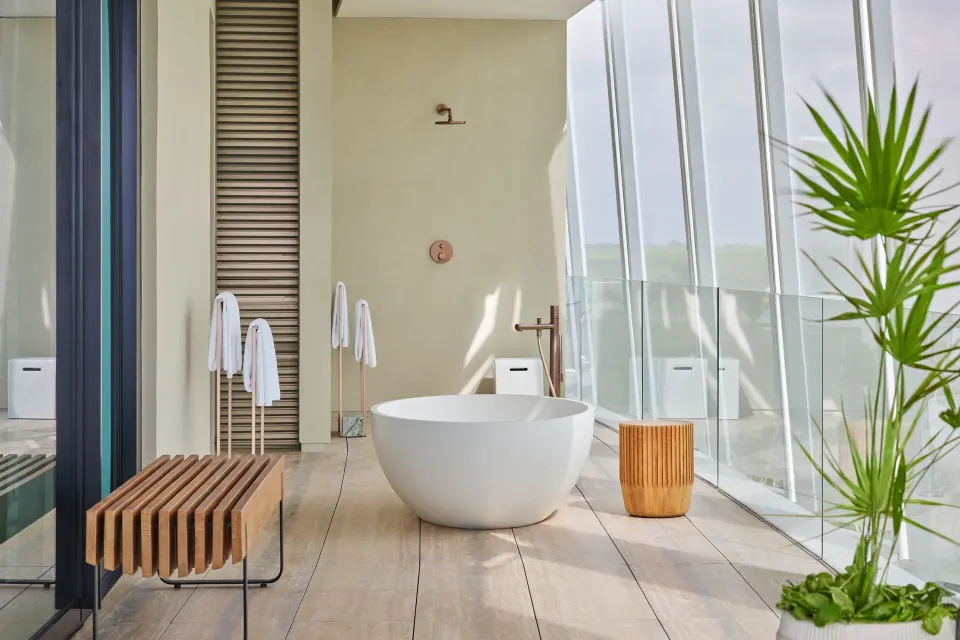 Outdoor soaking tub on the suite terrace at The St. Regis Kanai Resort, Riviera Maya.
