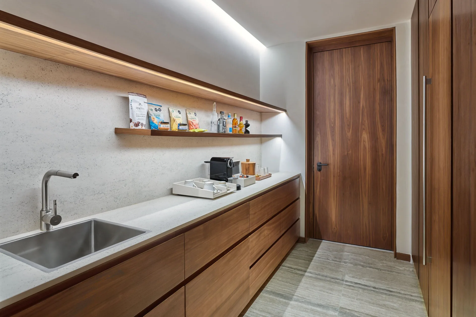 Wet bar and pantry in an Ocean View Suite at The St. Regis Kanai Resort, Riviera Maya.