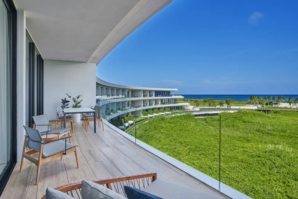 Ocean View Suite furnished terrace with coastal view at The St. Regis Kanai Resort, Riviera Maya.
