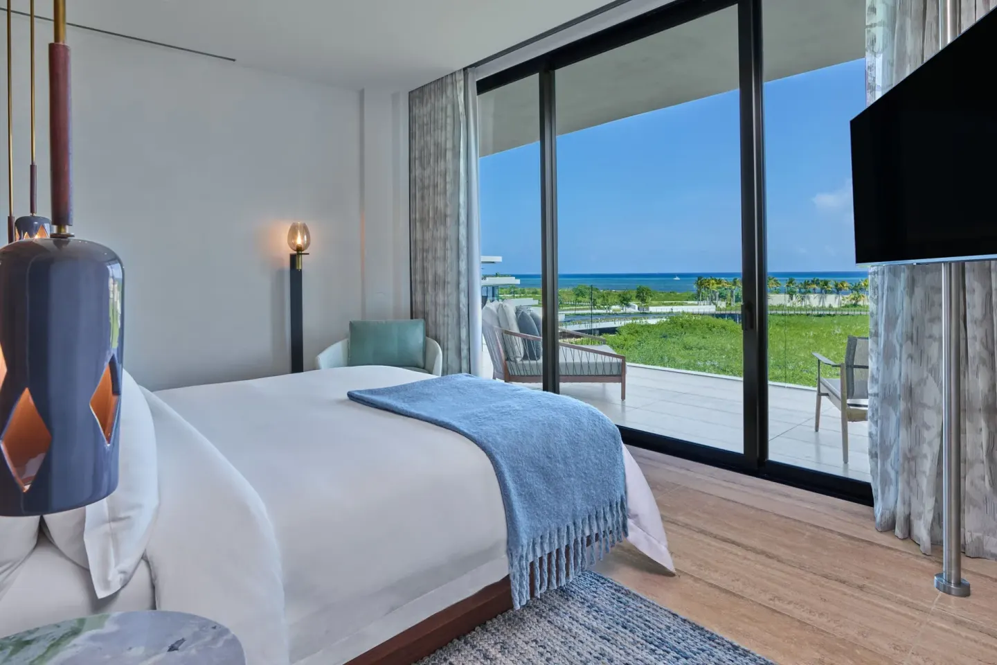 Ocean View Suite bedroom with terrace and sea view at The St. Regis Kanai Resort, Riviera Maya.
