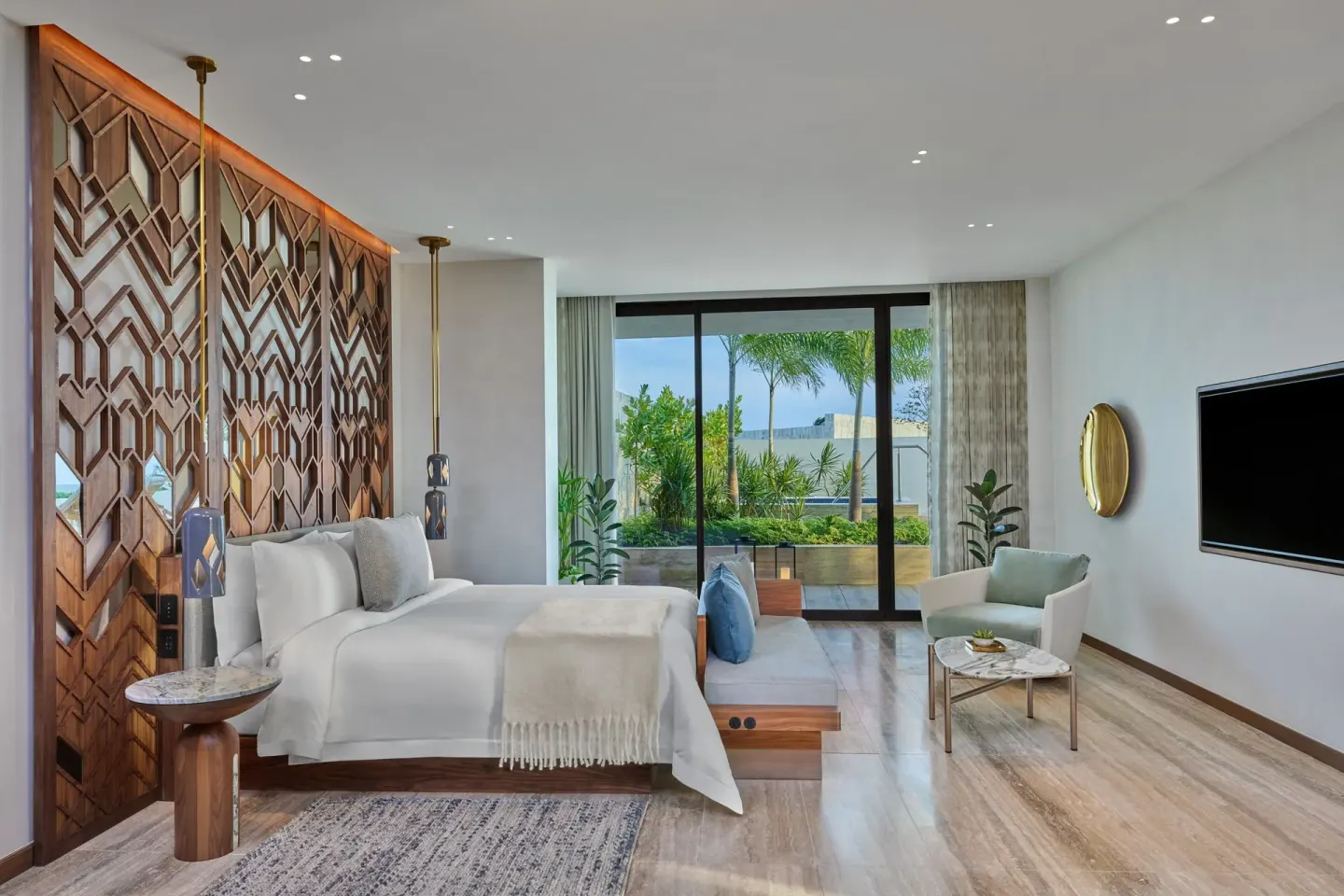 Ocean View Suite bedroom with king bed and terrace doors at The St. Regis Kanai Resort, Riviera Maya.